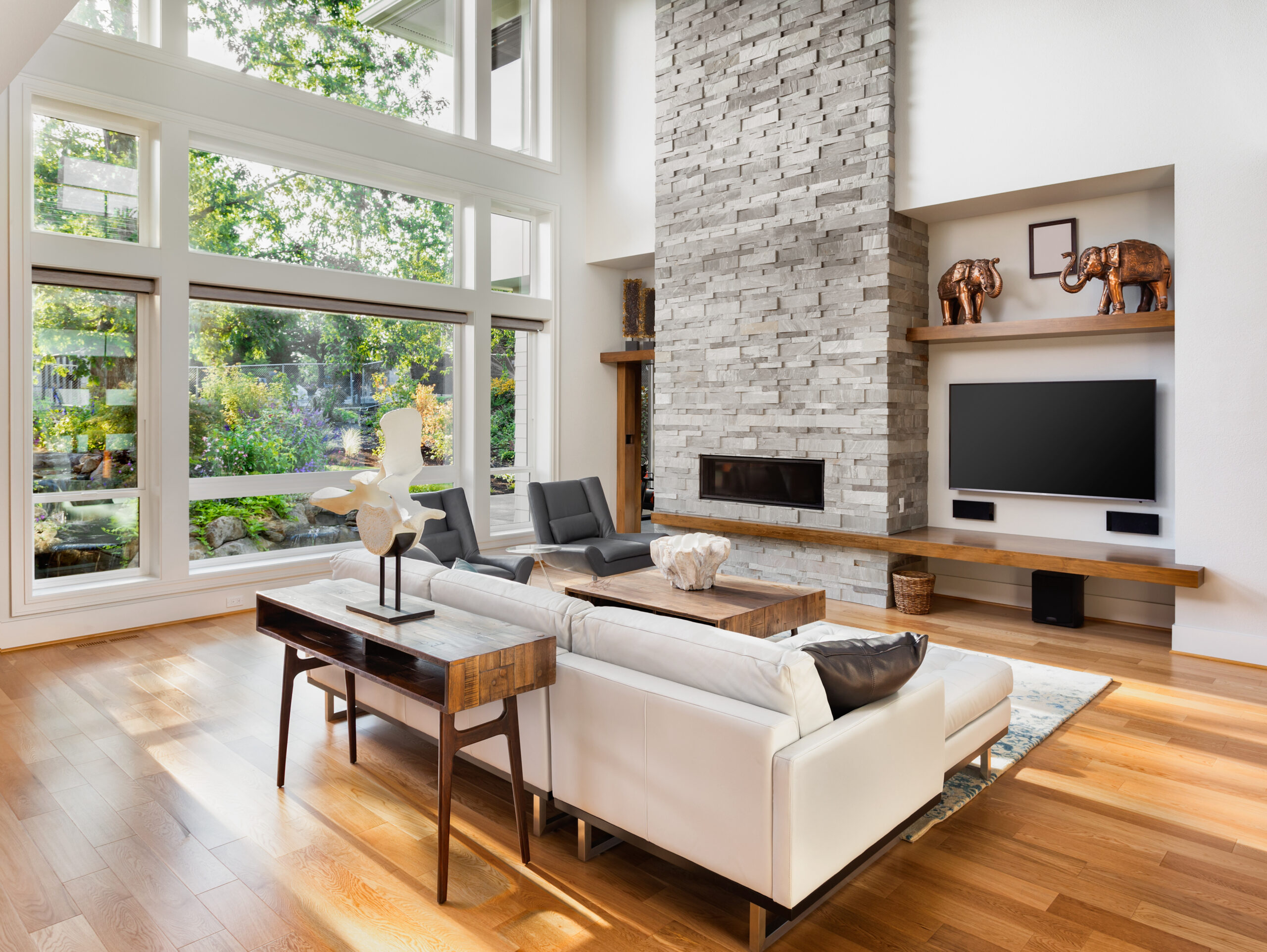 Clean windows bring light into a contemporary living room.